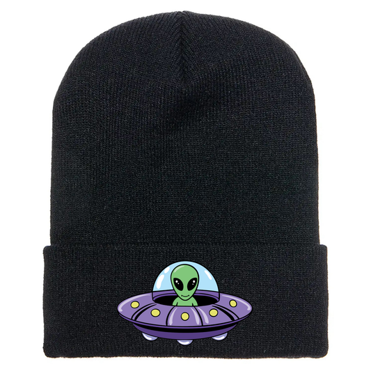 Black acrylic beanie featuring a cartoon alien inside a purple flying saucer with yellow lights and a blue dome.