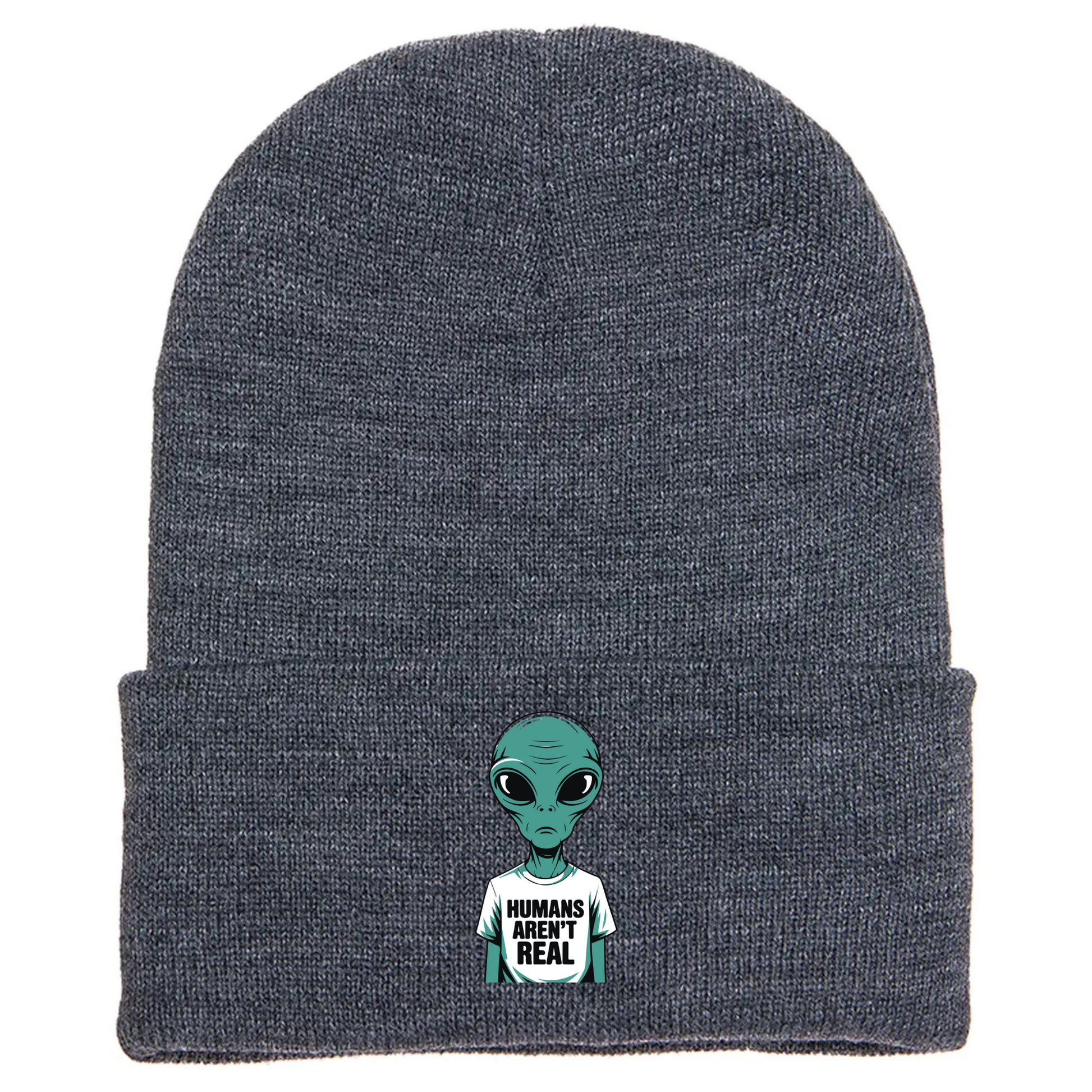 Gray acrylic beanie with a cartoon alien wearing a white T-shirt that says “Humans Aren’t Real” in bold black letters.