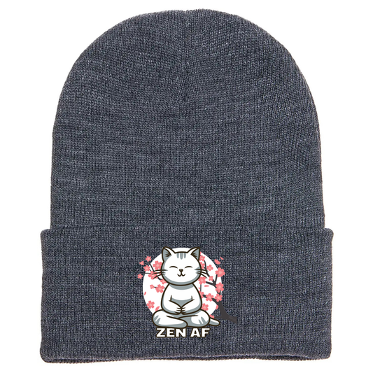 Gray cuffed beanie made of acrylic material with a meditating cartoon cat with cherry blossoms and the phrase “ZEN AF” below