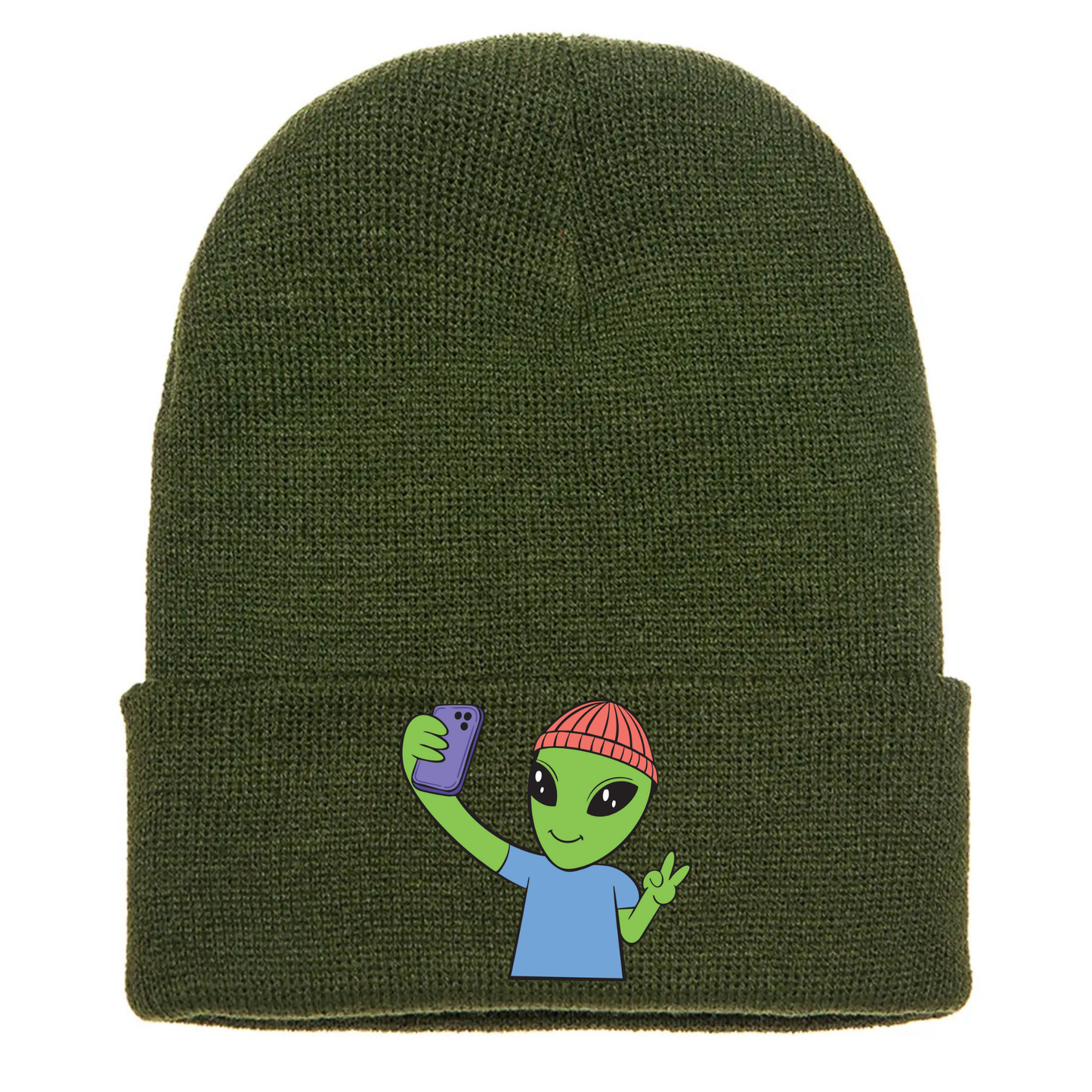 Olive green acrylic beanie featuring a cartoon alien in a red beanie taking a selfie and flashing a peace sign with one hand.