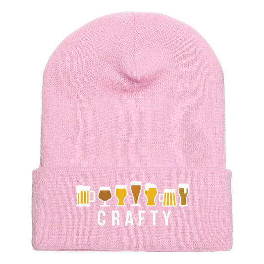 Pink acrylic beanie with seven cartoon beer glasses above the word “CRAFTY” in bold white text.